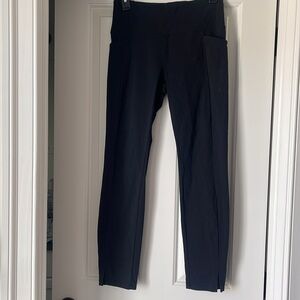 Athleta black leggings with slit at ankle